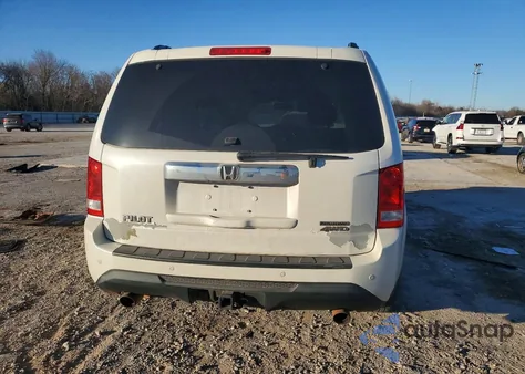 2014 Honda Pilot Touring z USA, uszkodzony, nr VIN 5FNYF4H91EB009052